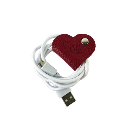 K0039VB | Heart Cable Winder Made in Italy in Genuine Full Grain Leather, Dollar Grain - Red Color - Dimensions: 5 x 8 x 0.5 cm - Packaging: Rigid Gift Box with bottom/lid