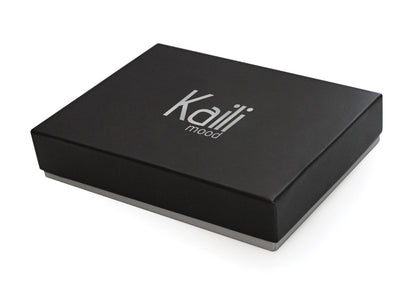 K0039VB | Heart Cable Winder Made in Italy in Genuine Full Grain Leather, Dollar Grain - Red Color - Dimensions: 5 x 8 x 0.5 cm - Packaging: Rigid Gift Box with bottom/lid