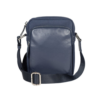 RB2002D | Nylon/Genuine Leather Shoulder Bag with a light grain. Zip closure and adjustable shoulder strap. Color: Blue. Dimensions: 15.5 x 21 x 7 cm. Packaging: Non-woven fabric bag.